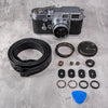 Film Kit for Leica M, Black Patina brass finish, laid out with black leather strap