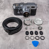 Film M Kit for Leica in Silver Chrome, laid out with the Helliot Monochrome leather strap