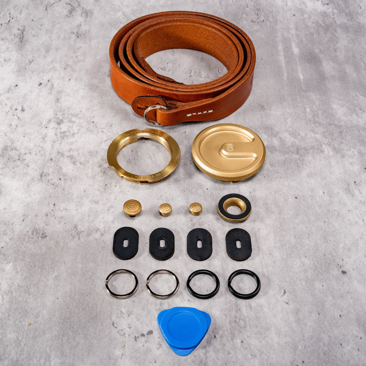 Film M Kit for Leica in Solid Brass, laid out with the Helliot Sahara leather strap