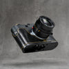 Black gloss lizard FlexCase on a Leica M11, three-quarter view from below of the Black Chrome base plate