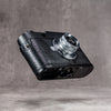 Underside of the black python FlexCase on a Leica M11, base plate and anti-skid pads showing