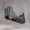 Black python FlexCase on its own, three-quarter view of the body and base plate