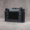 Back of the camera in a black python FlexCase, screen and controls clear of the leather