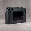 Back three-quarter view of the camera in a black python FlexCase