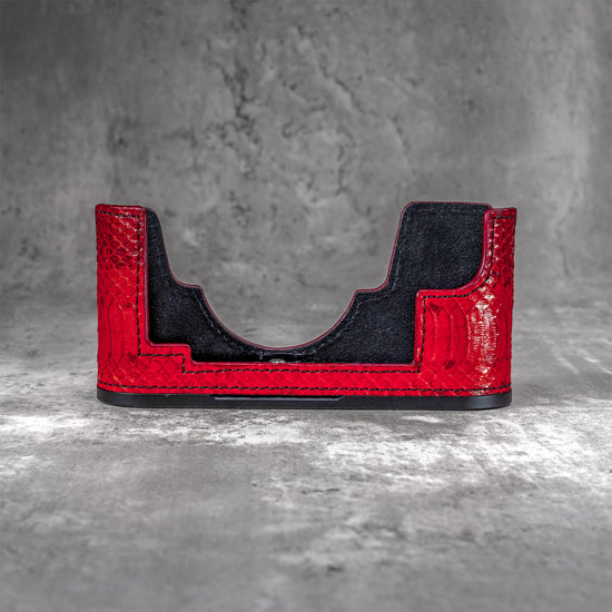 Red python FlexCase on its own, seen from the back, fully lined inside