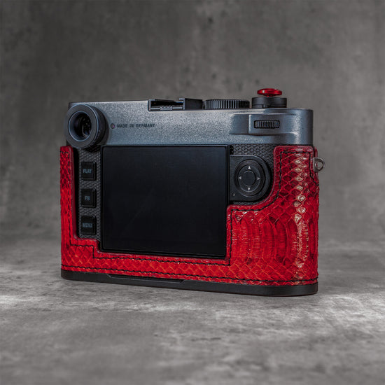 Back three-quarter view of the camera in a red python FlexCase