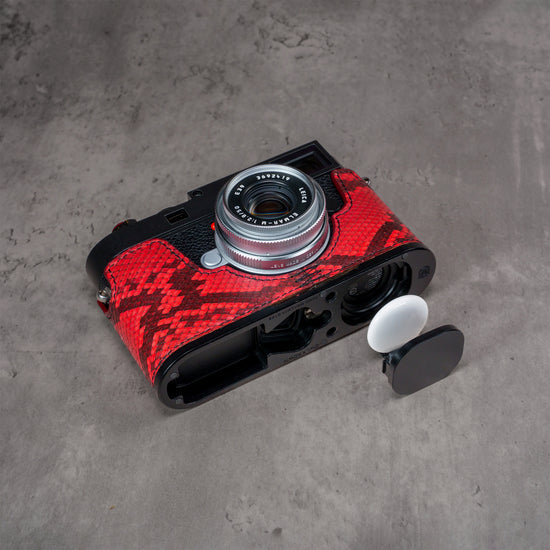Red Python FlexCase on a Leica M11 with the AirTag bay open