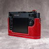 Back of a Leica M11 in the Ruby Gloss FlexCase, screen and thumb controls left clear