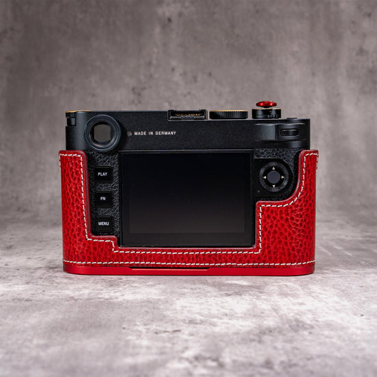 Rear view of the Ruby Gloss FlexCase on a Leica M11, showing the cutaway around the screen and buttons