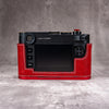 Rear view of the Ruby Gloss FlexCase on a Leica M11, showing the cutaway around the screen and buttons