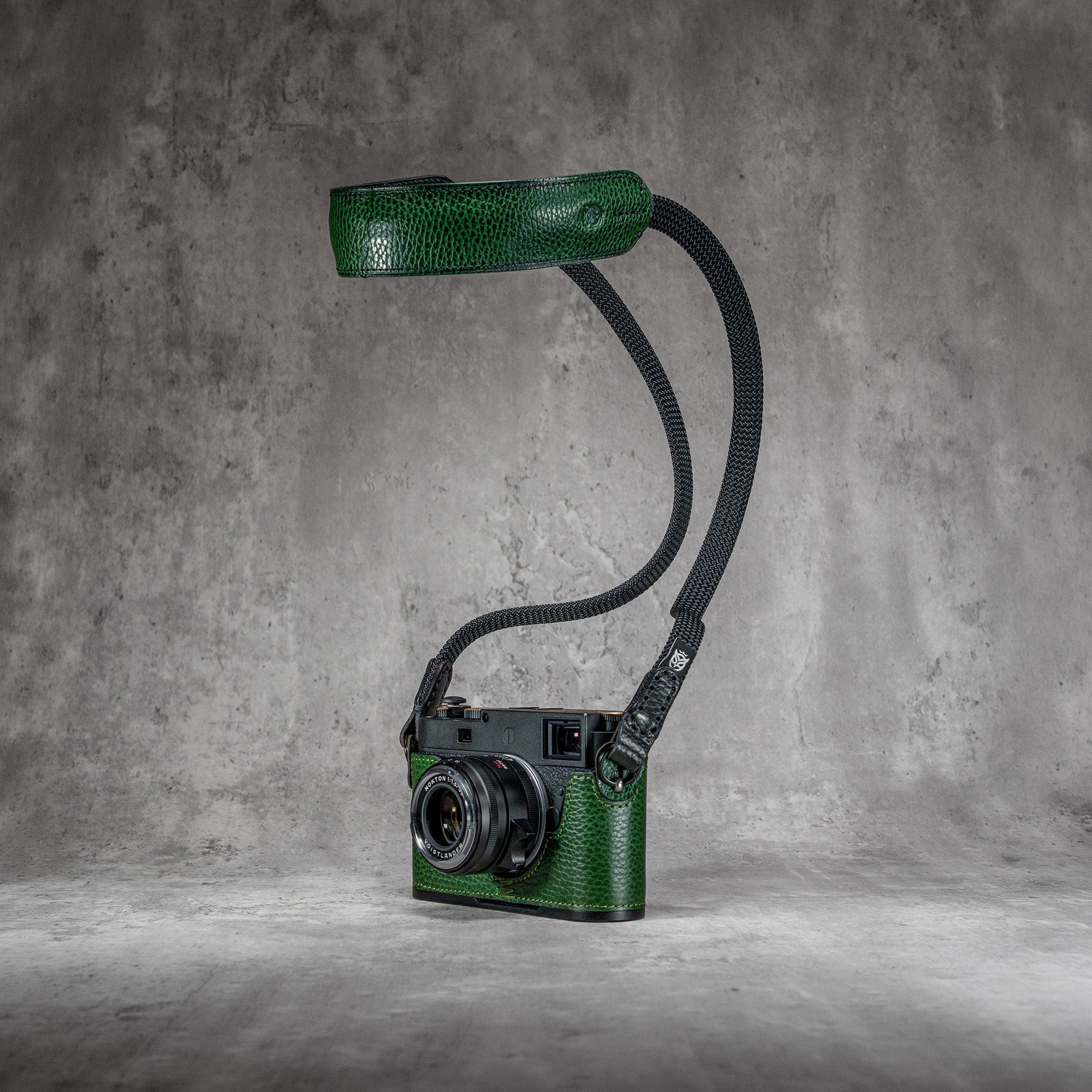 The Emerald Gloss FlexCase on a Leica M with the matching Classic Flat Padded Rope camera strap