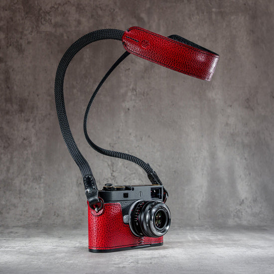 The Ruby Gloss FlexCase on a Leica M with the matching Classic Flat Padded Rope camera strap