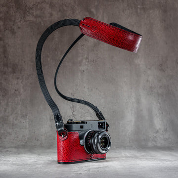 The Ruby Gloss FlexCase on a Leica M with the matching Classic Flat Padded Rope camera strap