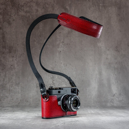 The Ruby Gloss FlexCase on a Leica M with the matching Classic Flat Padded Rope camera strap