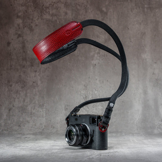 The Ruby Gloss FlexCase on a Leica M with the matching Classic Flat Padded Rope camera strap