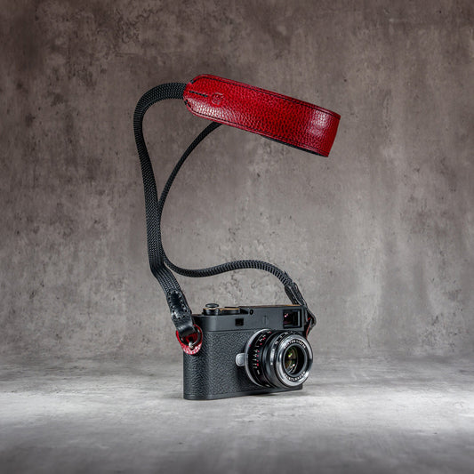 The Ruby Gloss FlexCase on a Leica M with the matching Classic Flat Padded Rope camera strap