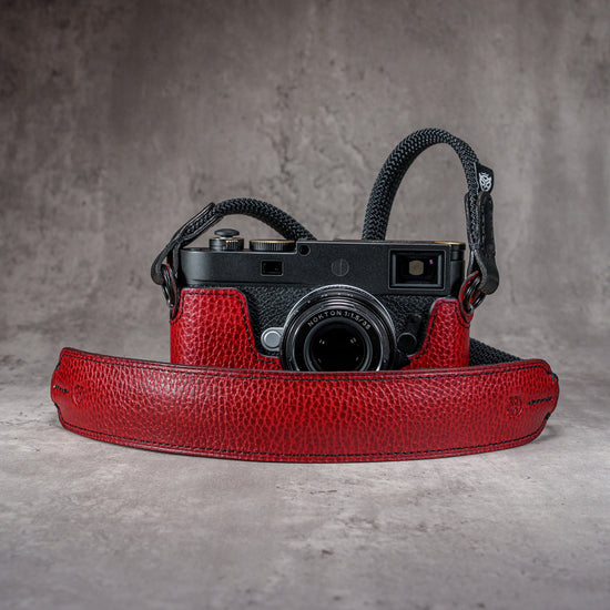 The Ruby Gloss FlexCase on a Leica M with the matching Classic Flat Padded Rope camera strap