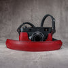 The Ruby Gloss FlexCase on a Leica M with the matching Classic Flat Padded Rope camera strap