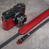 The Ruby Gloss FlexCase on a Leica M with the matching Classic Flat Padded Rope camera strap