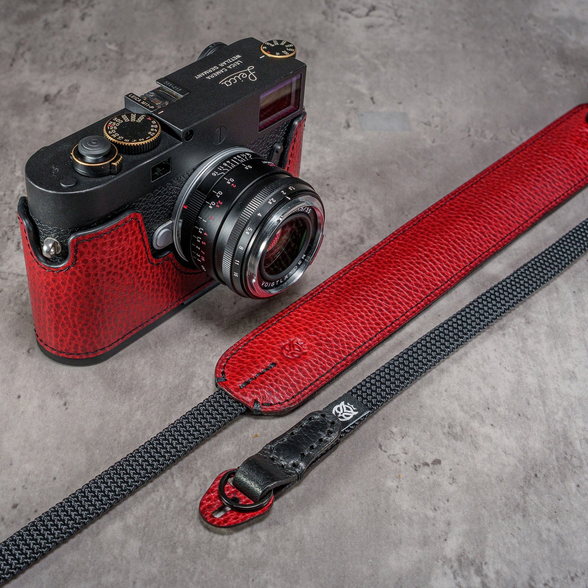 The Ruby Gloss FlexCase on a Leica M with the matching Classic Flat Padded Rope camera strap