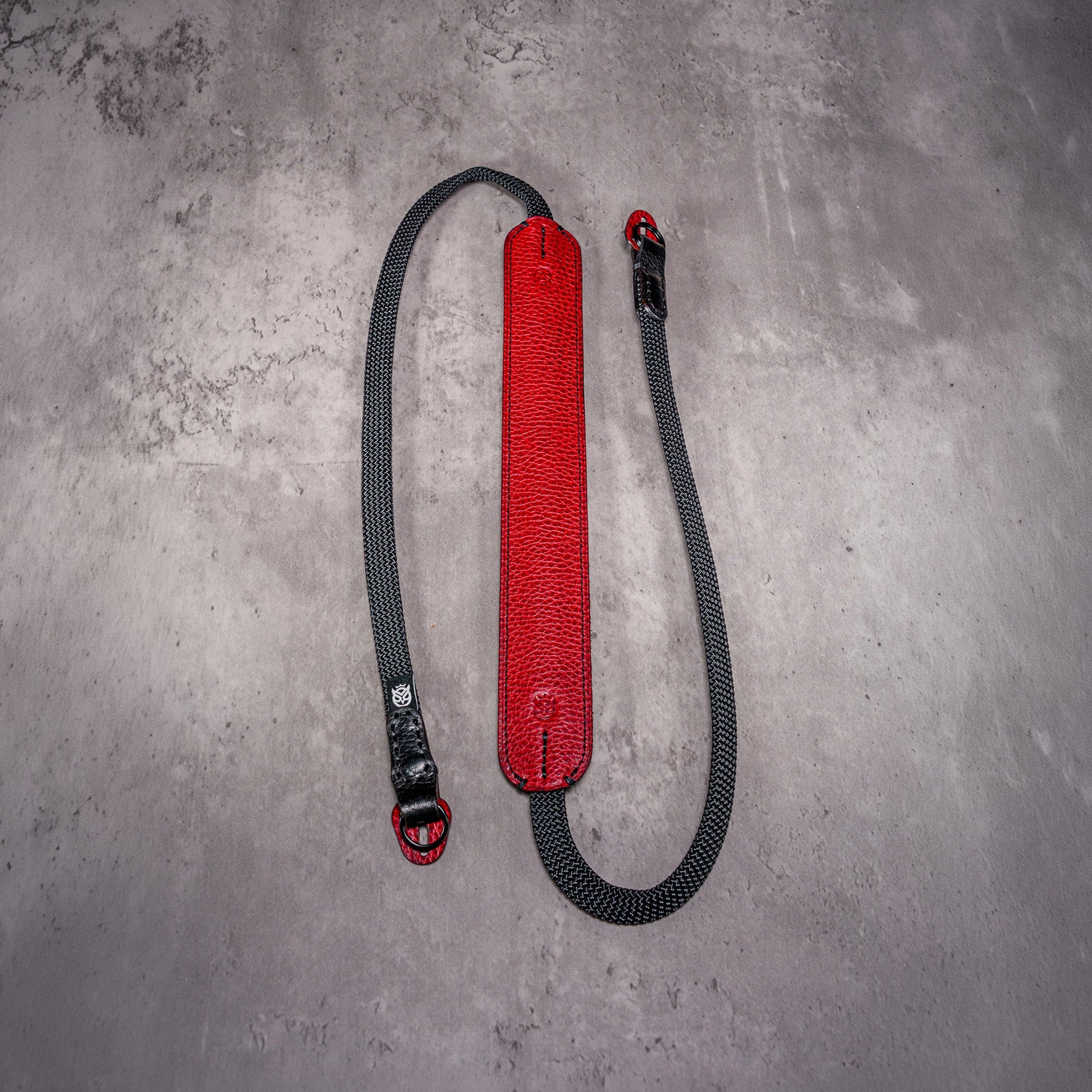 The Ruby Gloss FlexCase on a Leica M with the matching Classic Flat Padded Rope camera strap