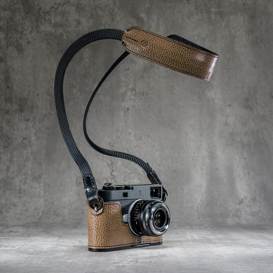 The Taupe Gloss FlexCase on a Leica M with the matching Classic Flat Padded Rope camera strap