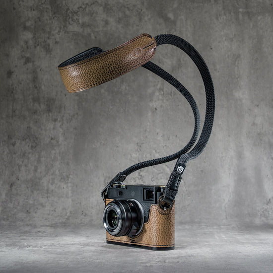 The Taupe Gloss FlexCase on a Leica M with the matching Classic Flat Padded Rope camera strap