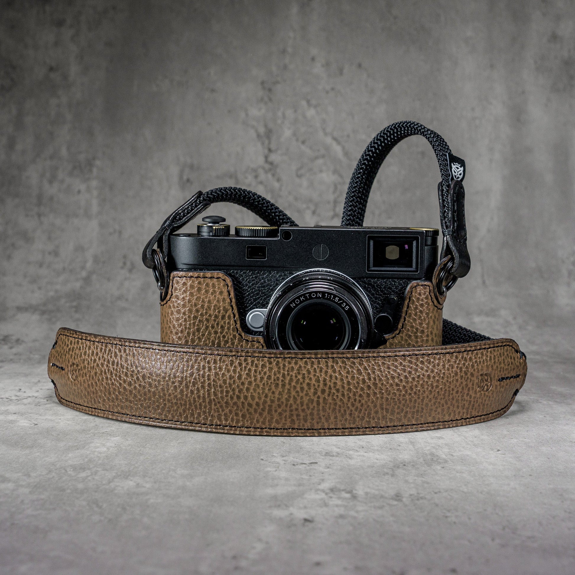The Taupe Gloss FlexCase on a Leica M with the matching Classic Flat Padded Rope camera strap
