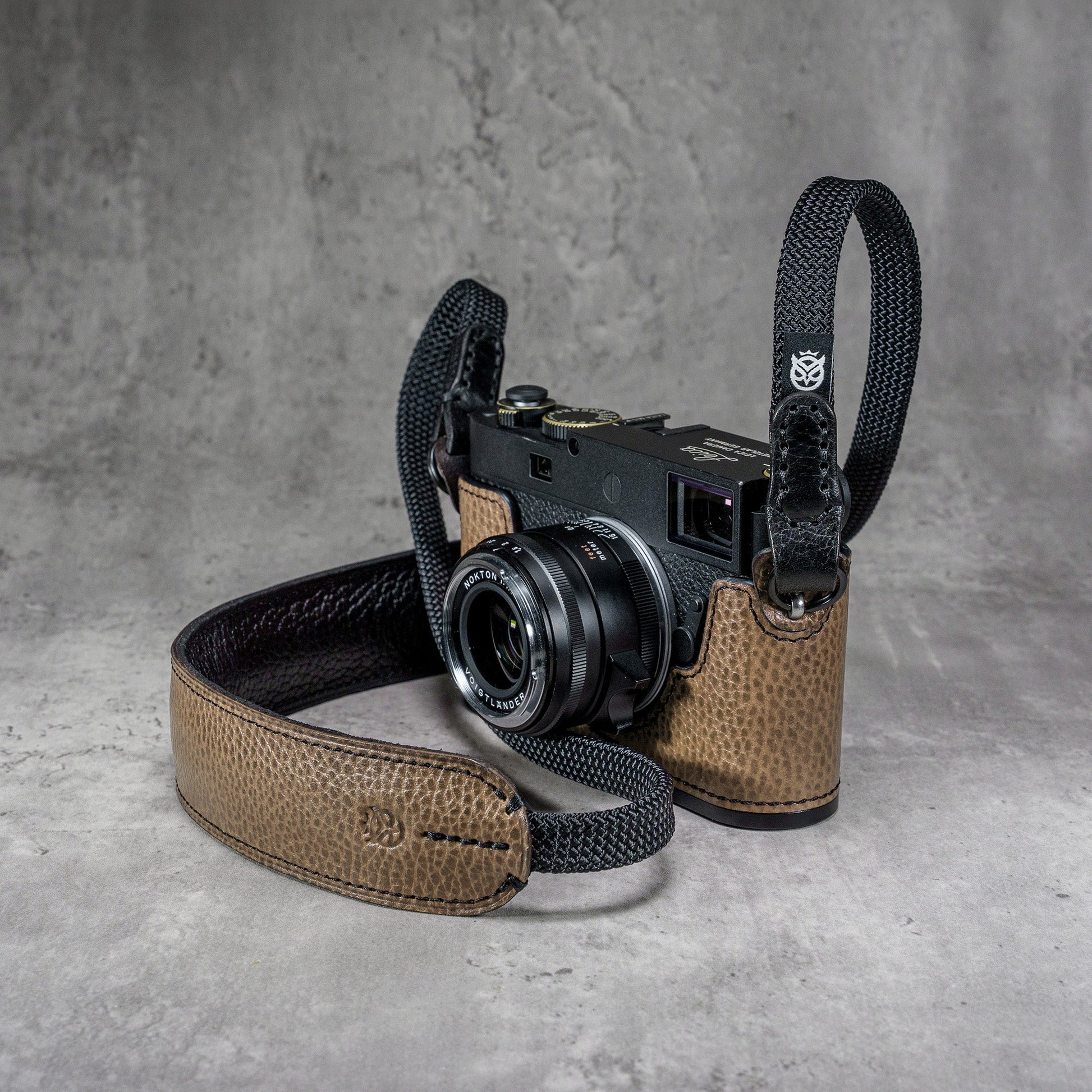 The Taupe Gloss FlexCase on a Leica M with the matching Classic Flat Padded Rope camera strap