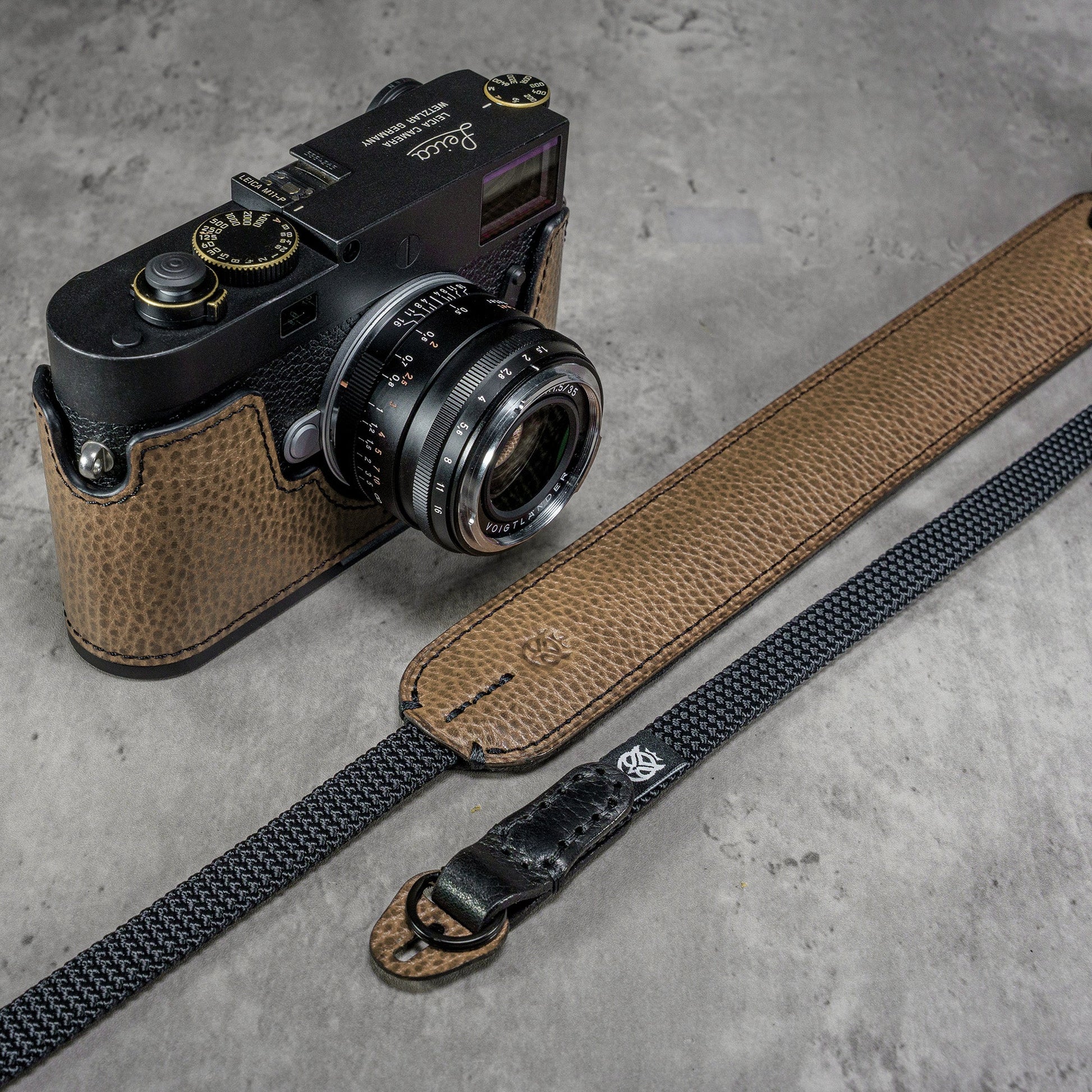 The Taupe Gloss FlexCase on a Leica M with the matching Classic Flat Padded Rope camera strap
