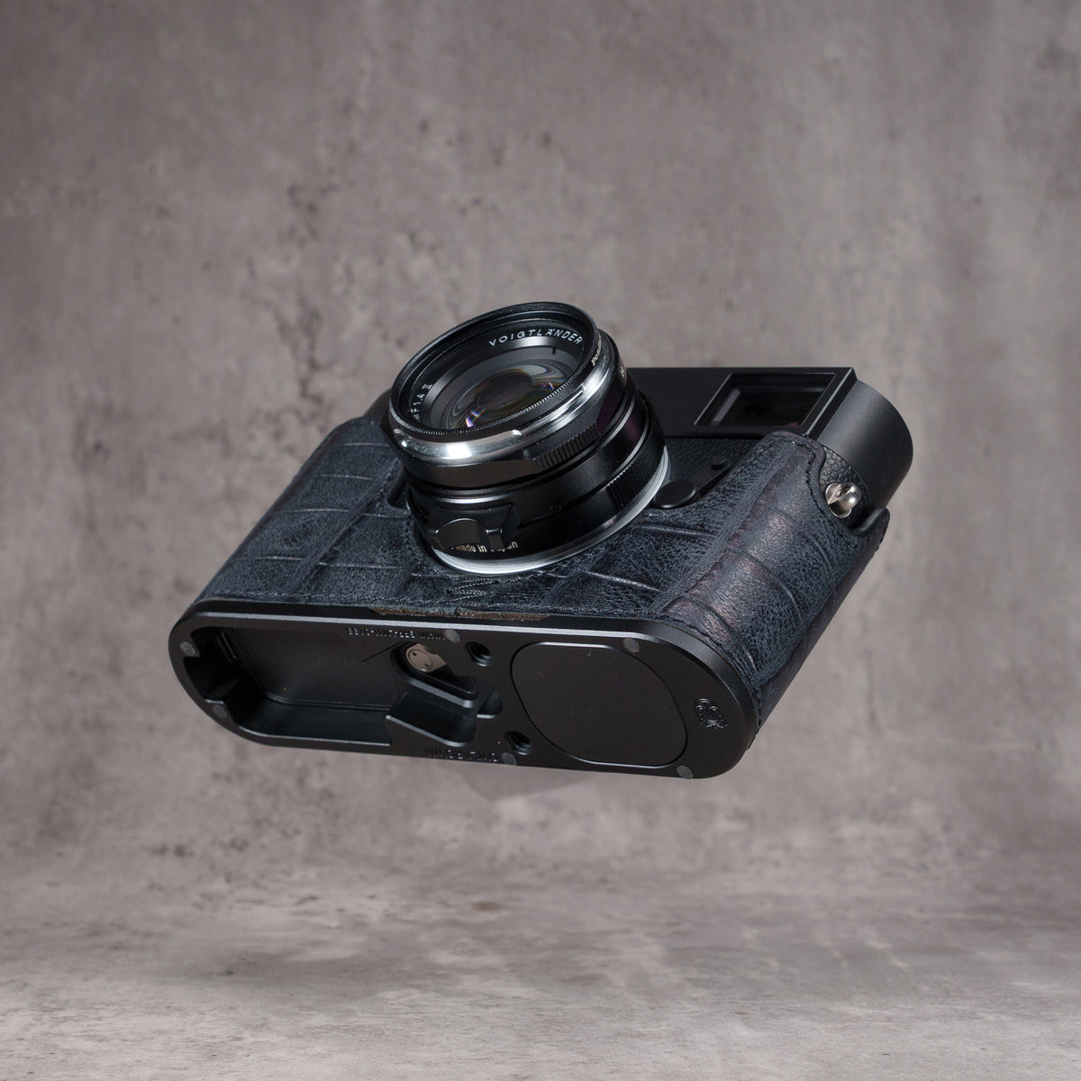 Black Swamp FlexCase underside at an angle, Black Chrome plate with the concealed Arca profile
