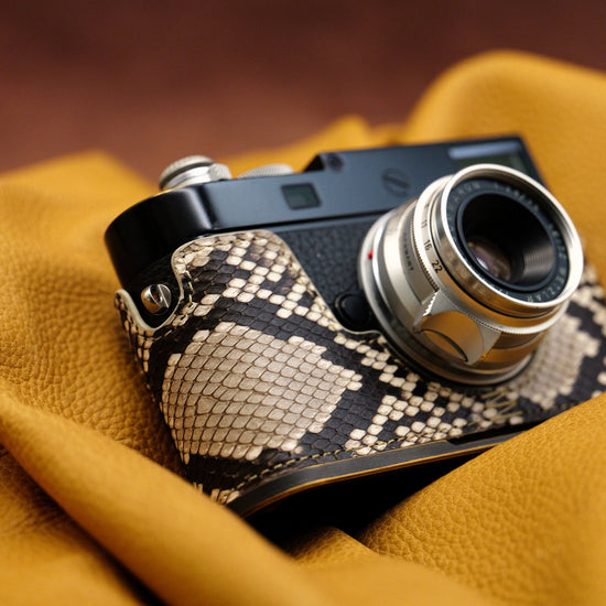 Python FlexCase on a Leica M11, front three-quarter view with the lens forward