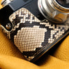Python scales and the strap lug of the FlexCase, seen from above