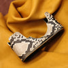 Python FlexCase for the Leica M11 on its own, on mustard leather