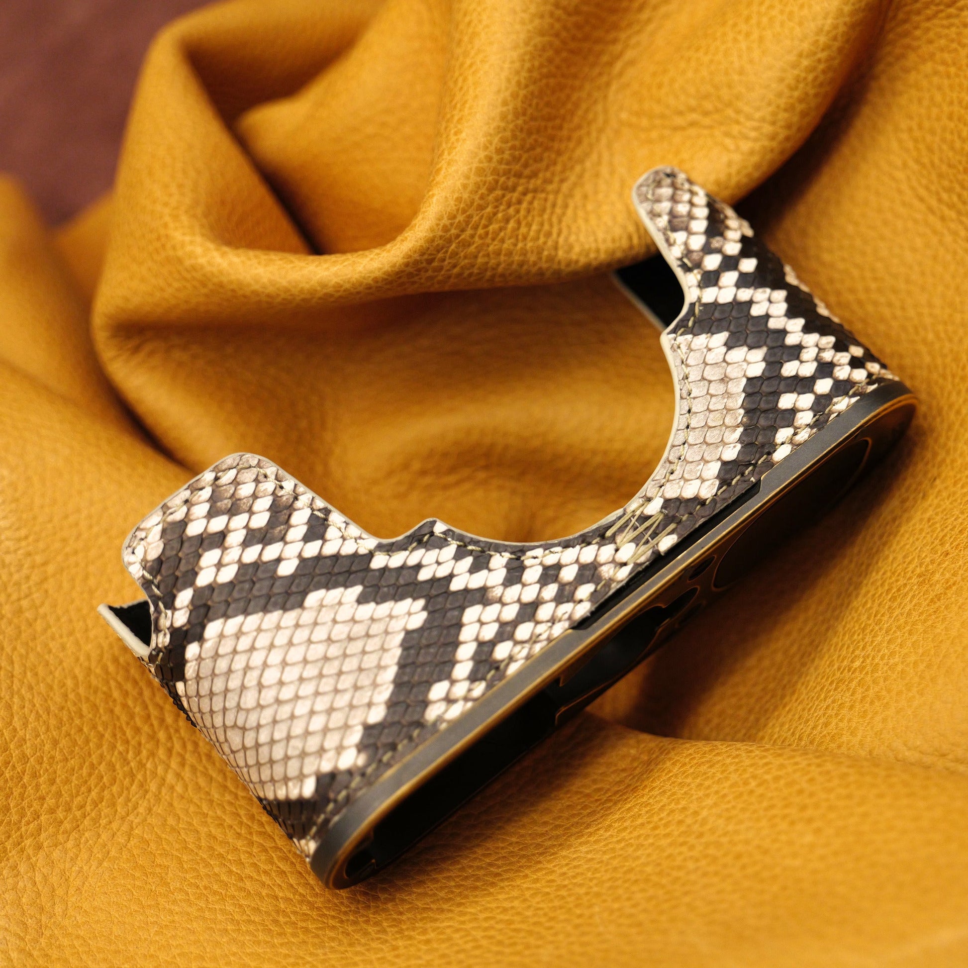 Python FlexCase for the Leica M11 on its own, on mustard leather