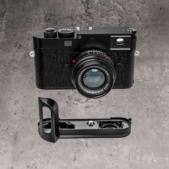 A Leica M10 photographed from the front with the FlexGrip below it