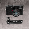 A Leica M10 photographed from the front with the FlexGrip below it