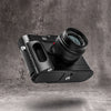 A Leica M10 with the FlexGrip fitted, photographed at an angle above its shadow