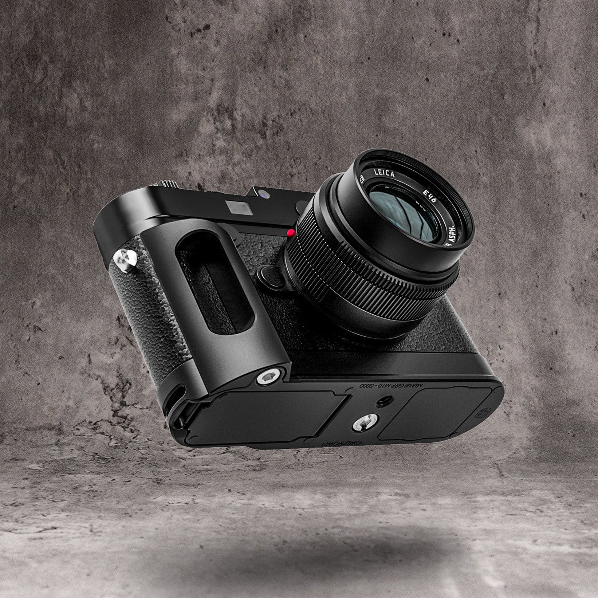 A Leica M10 with the FlexGrip fitted, photographed at an angle above its shadow