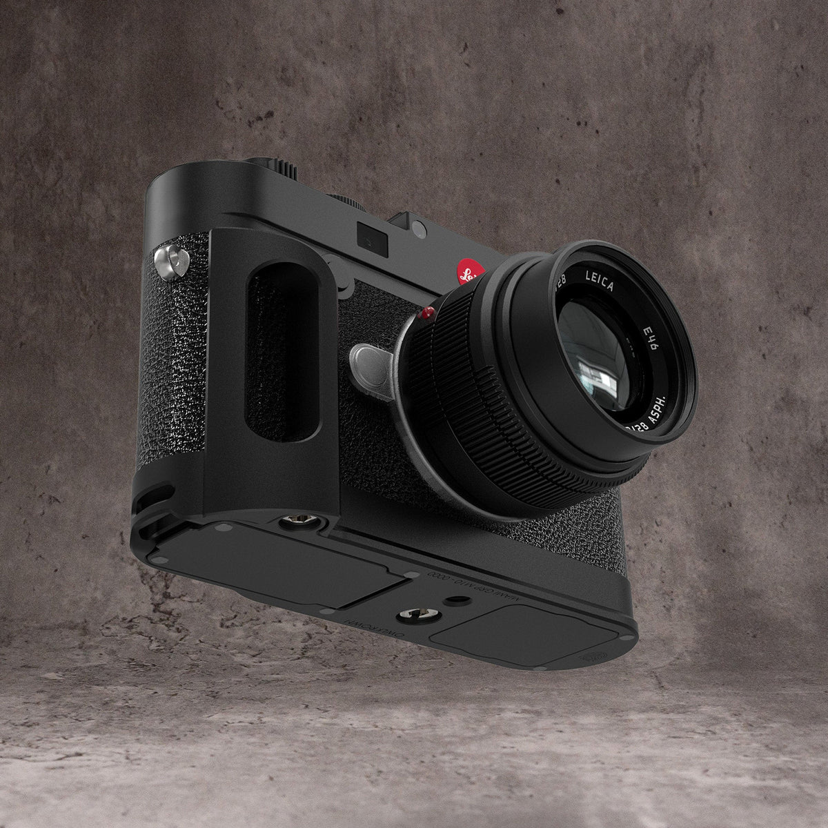 Black Chrome FlexGrip fitted to a Leica M10, seen at three quarters with the lens forward