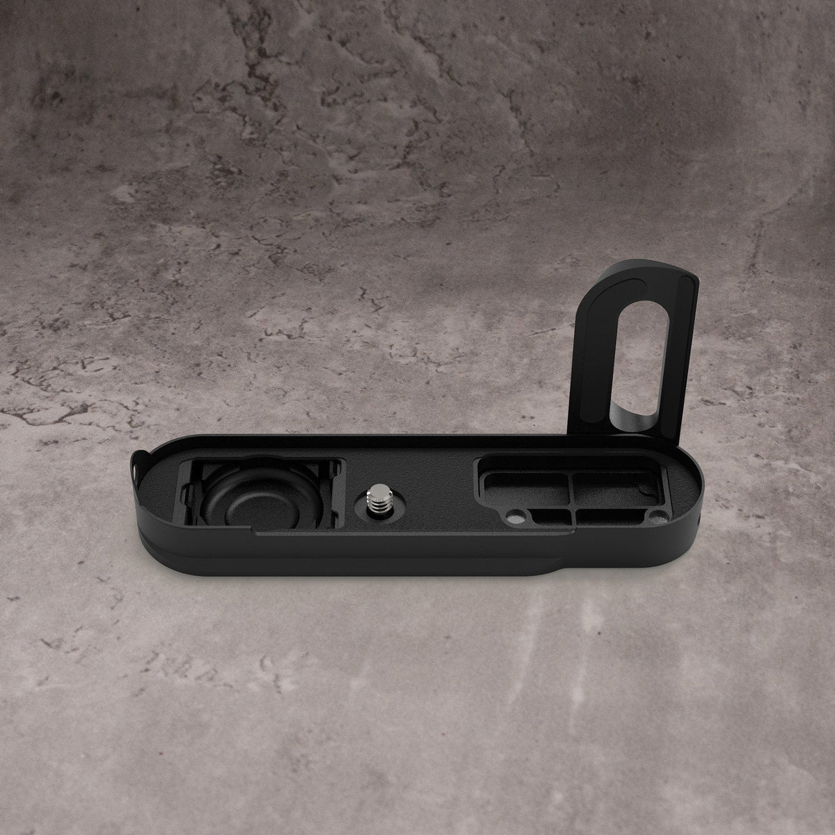 The Black Chrome FlexGrip for the Leica M10 from above, showing the interior compartments and the retaining screw