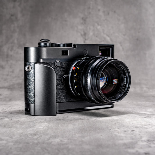 Black Chrome FlexGrip fitted to a Leica M10, front three quarter view