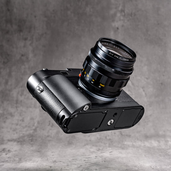 Leica M10 with the Black Chrome FlexGrip, seen from below at an angle