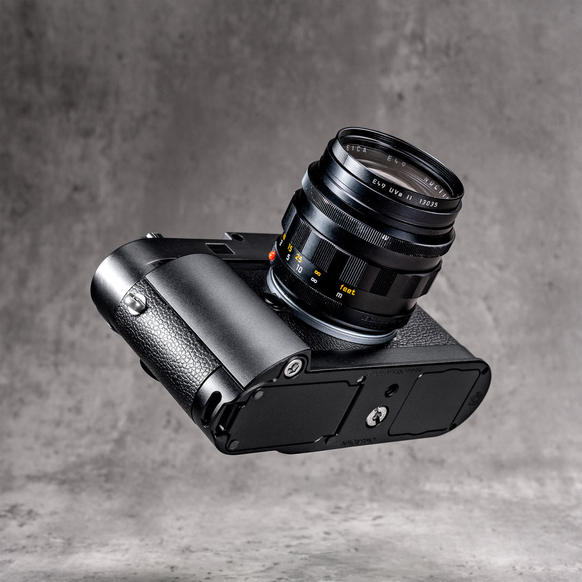 Leica M10 with the Black Chrome FlexGrip, seen from below at an angle