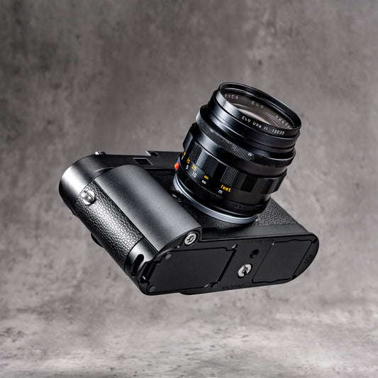 Leica M10 with the Black Chrome FlexGrip, seen from below at an angle