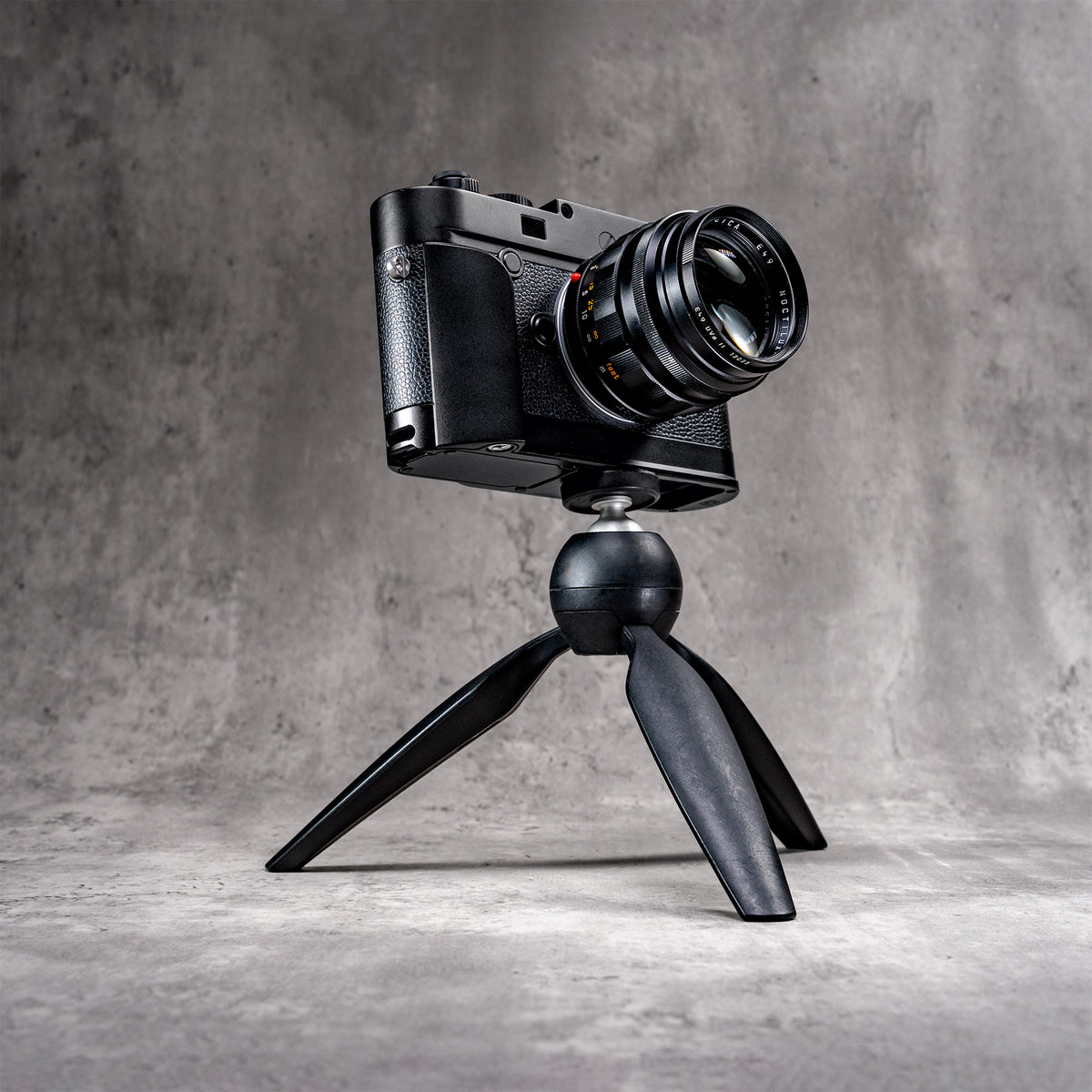 Leica M10 with the Black Chrome FlexGrip on a tabletop tripod