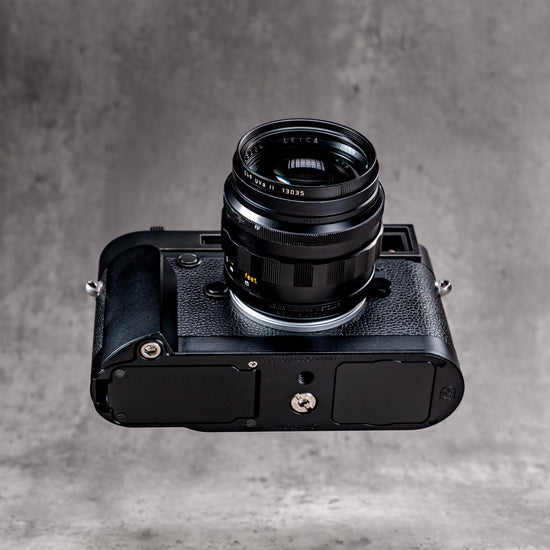 Leica M10 with the Black Chrome FlexGrip, seen from below showing the baseplate