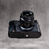 Leica M10 with the Black Chrome FlexGrip, seen from below showing the baseplate
