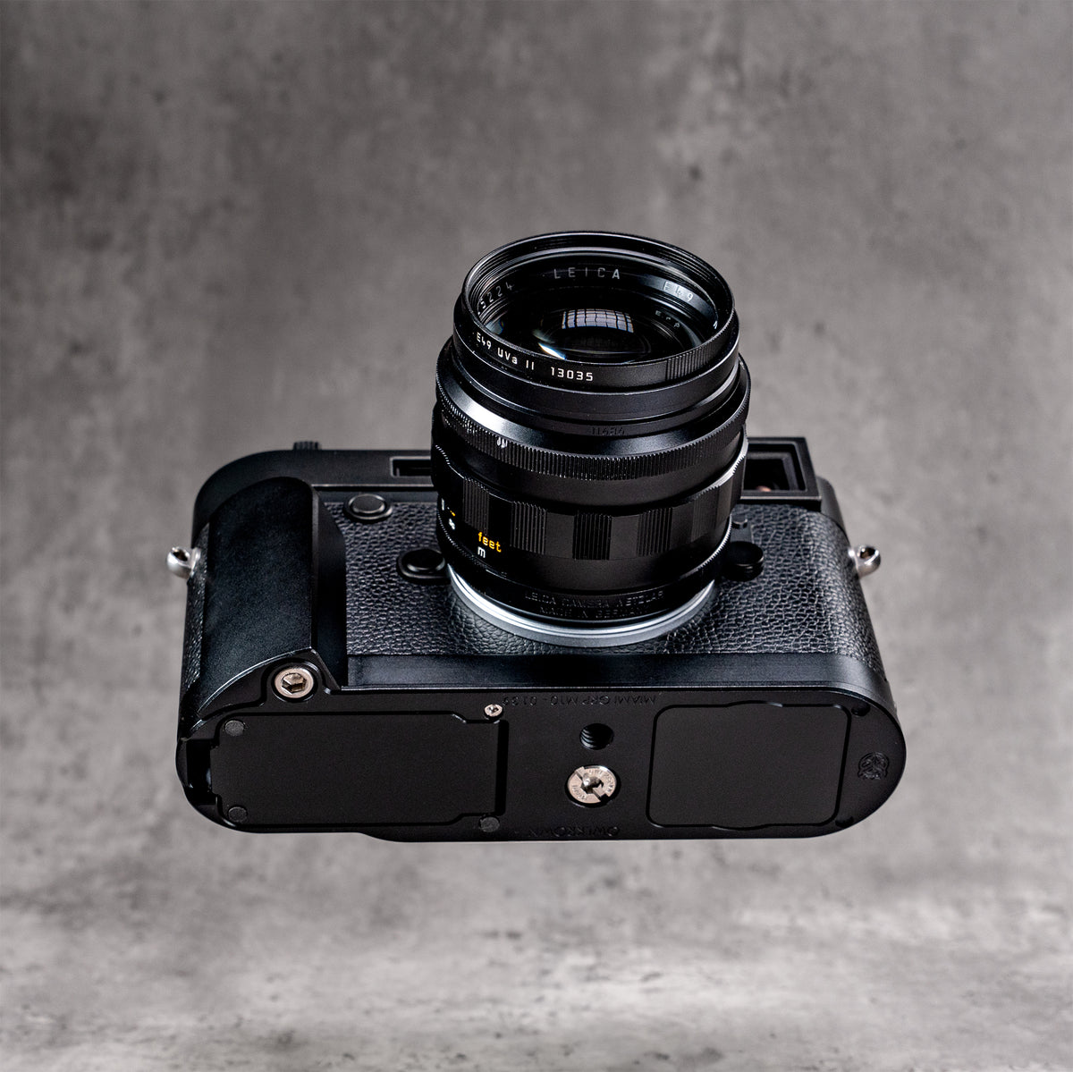 Leica M10 with the Black Chrome FlexGrip, seen from below showing the baseplate