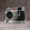 Silver Chrome FlexGrip fitted to a Leica M10, front three quarter view